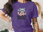 Mindfully Messy Raccoon Illustration Purple Shirt
