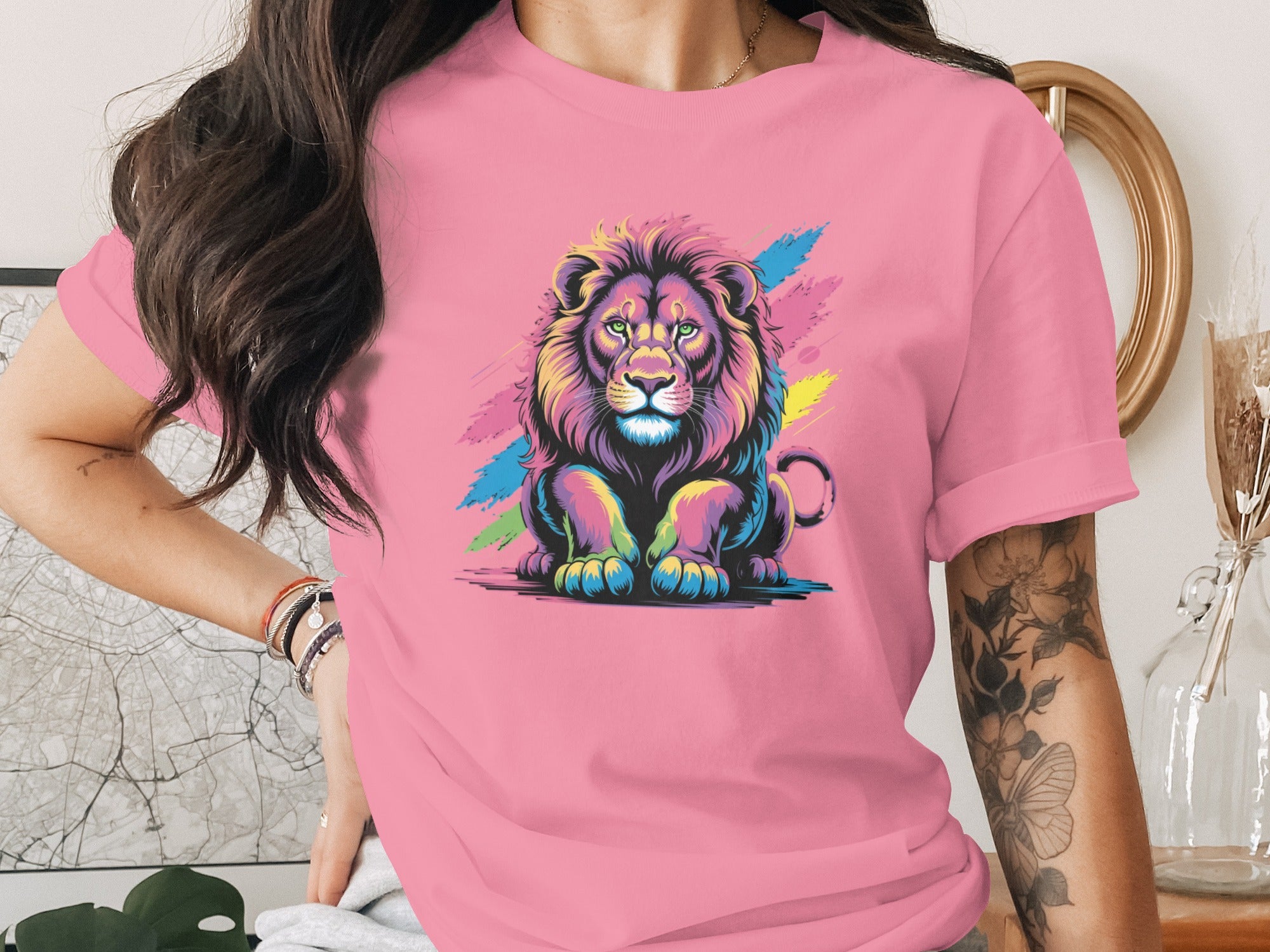 Colorful Lion Graphic on Pink T-Shirt Design